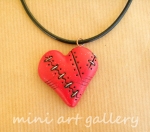 Red heart Valentine / Steampunk stitched wounded / polymer clay pendant
