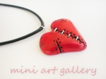 Red heart Valentine / Steampunk stitched wounded / polymer clay pendant side view