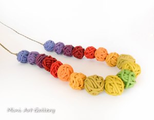 Minimalistic necklace with polymer clay ooak handmade beads yarn ball thread in autumn fall colors and macrame braiding rainbow