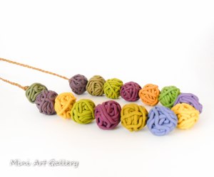 Minimalistic necklace with polymer clay ooak handmade beads yarn ball thread in autumn fall colors and macrame braiding
